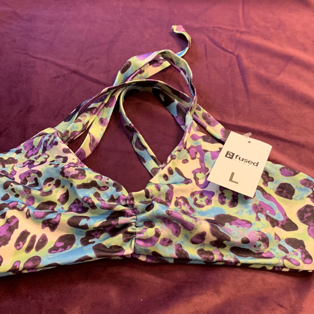 Nwt fused bikini top size large green, blue,purple, and black leopard print.